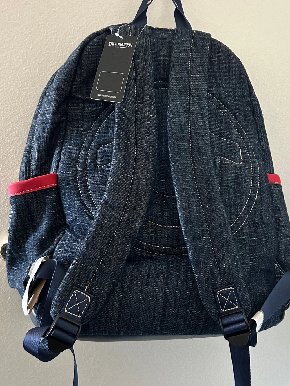 True Religion Dark Denim Backpack with Red Accents